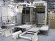 Jorgensen depalletsing system for glass jars and tops.